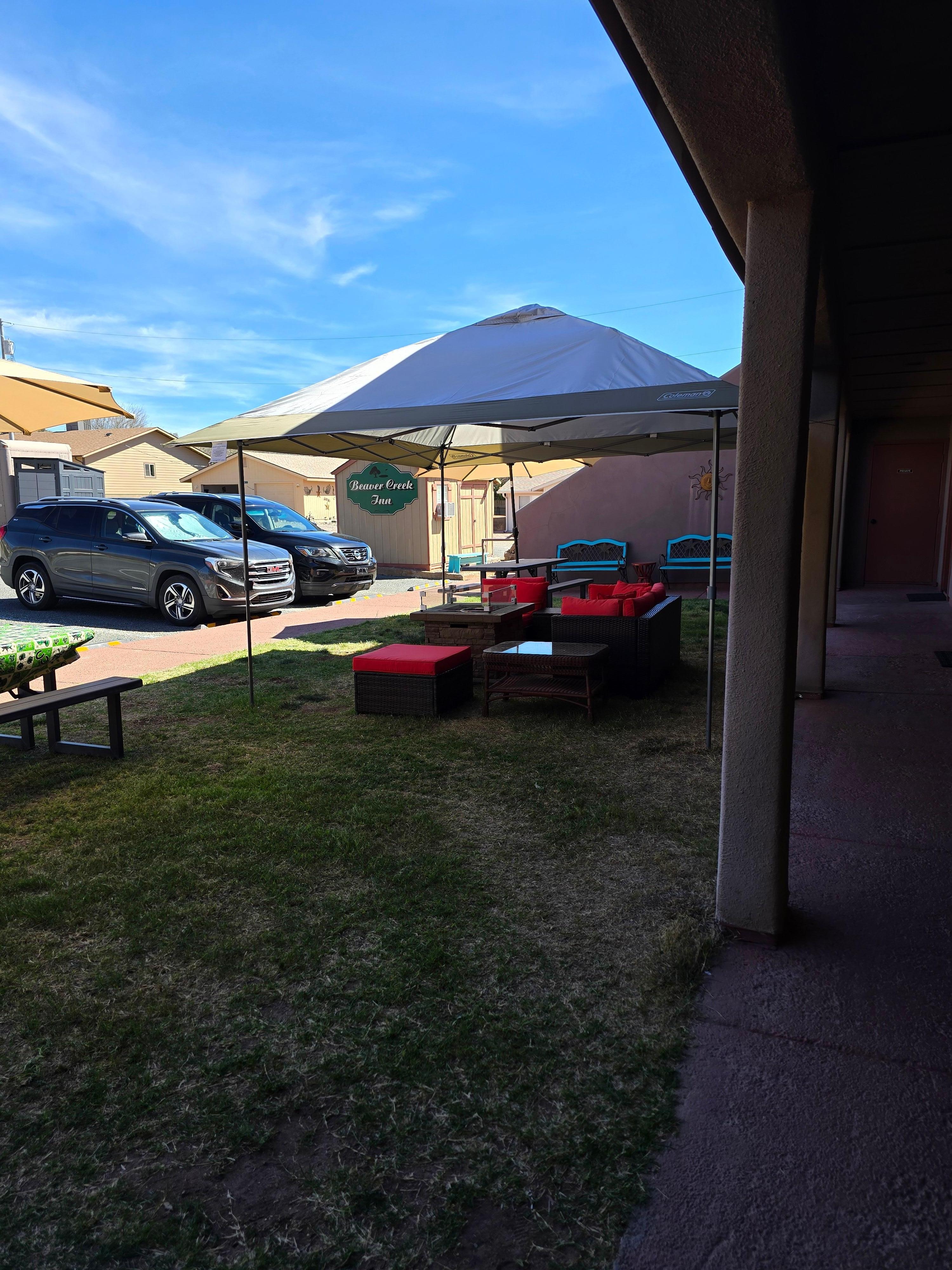 Outdoor community sitting area with fireplace