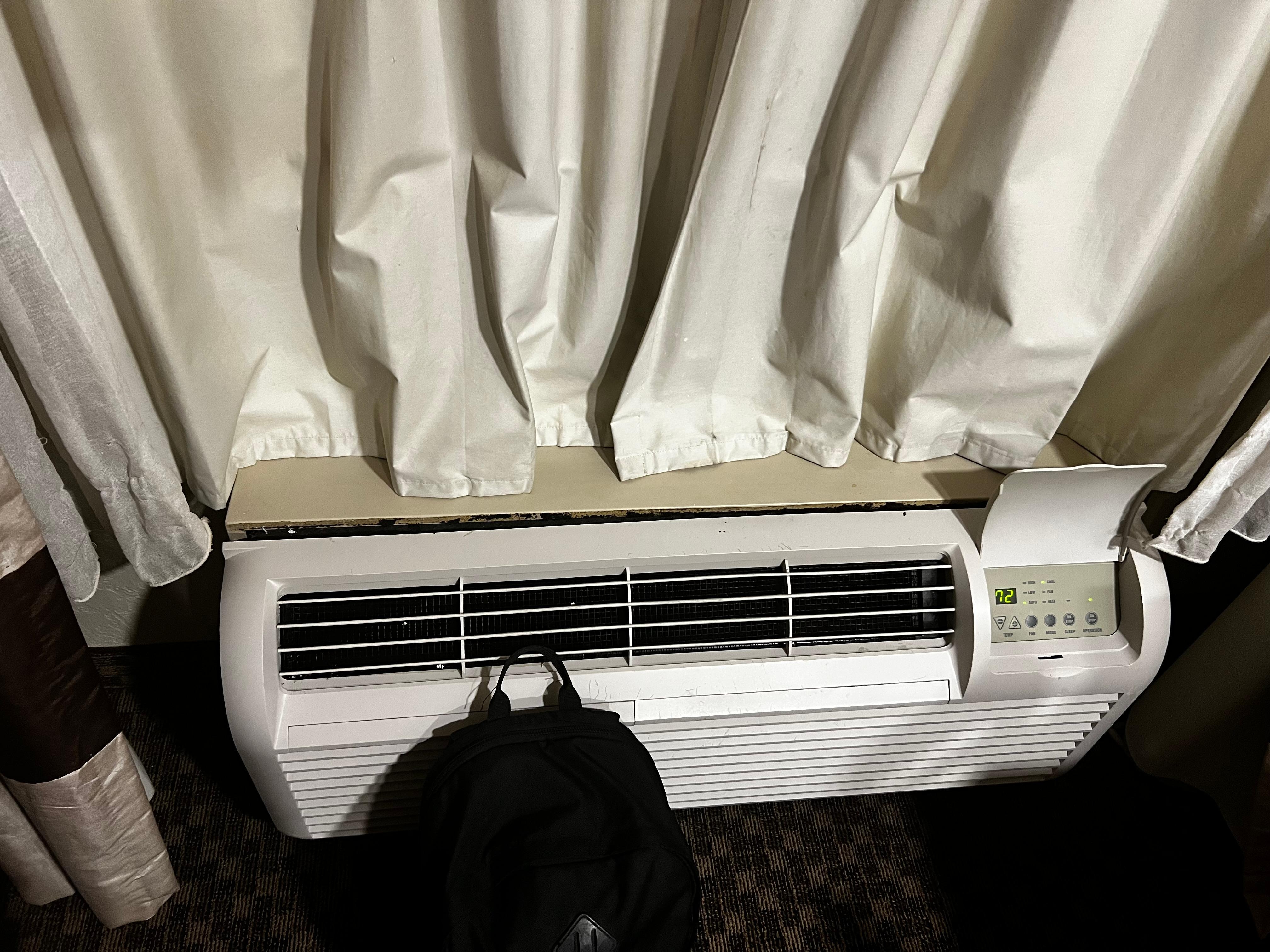 Stained curtains, ac unit was about ready to fall off the wall, and couldn’t maintain the room. It was hot as hell.