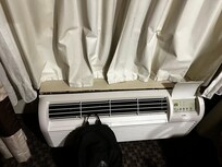 Stained curtains, ac unit was about ready to fall off the wall, and couldn’t maintain the room. It was hot as hell.