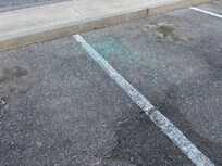 Glass in parking lot