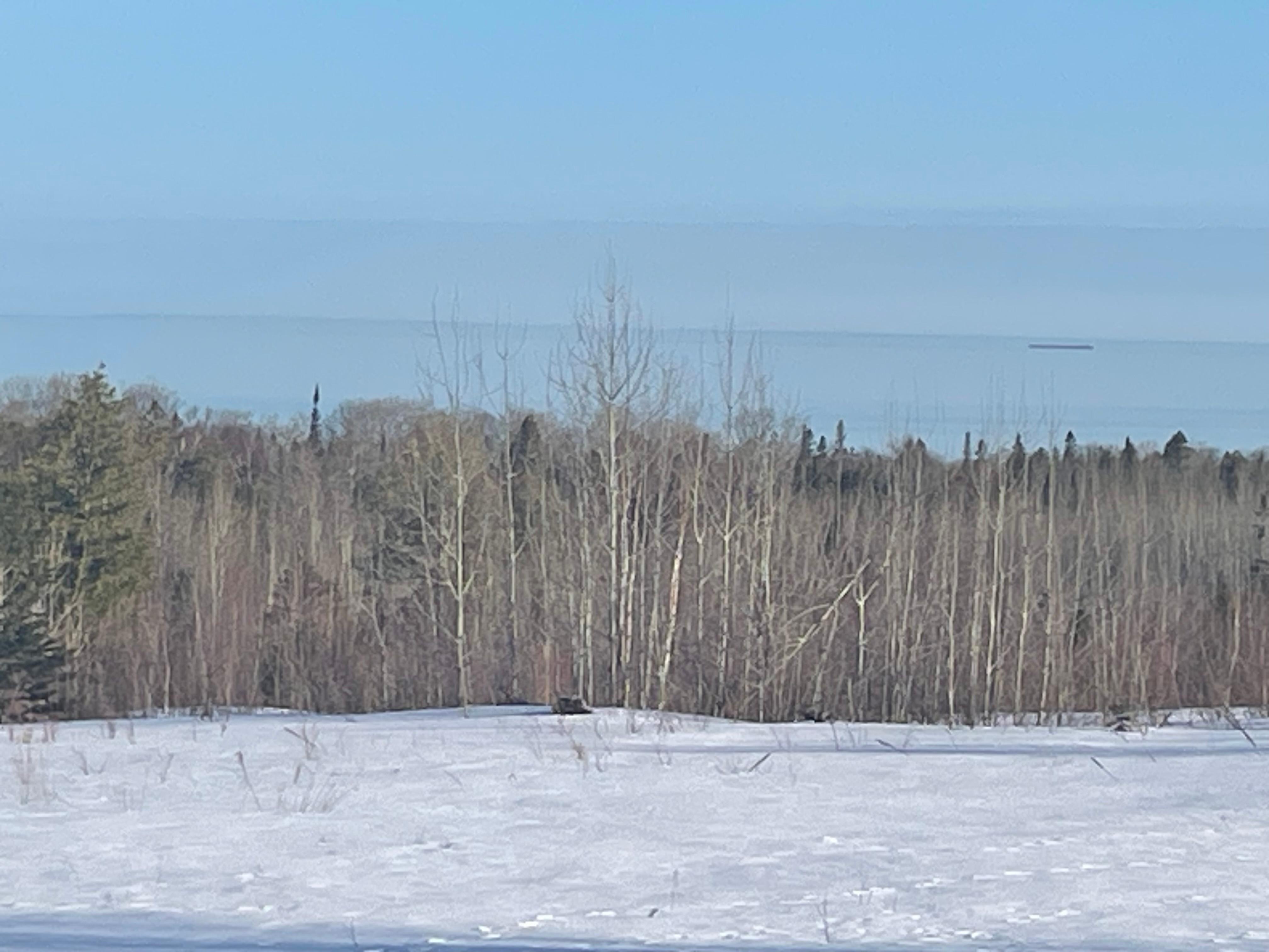 View of a freighter on Lake Superior from porch