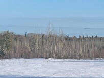 View of a freighter on Lake Superior from porch
