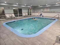 Swimming in the pool. Wish it was warmer.