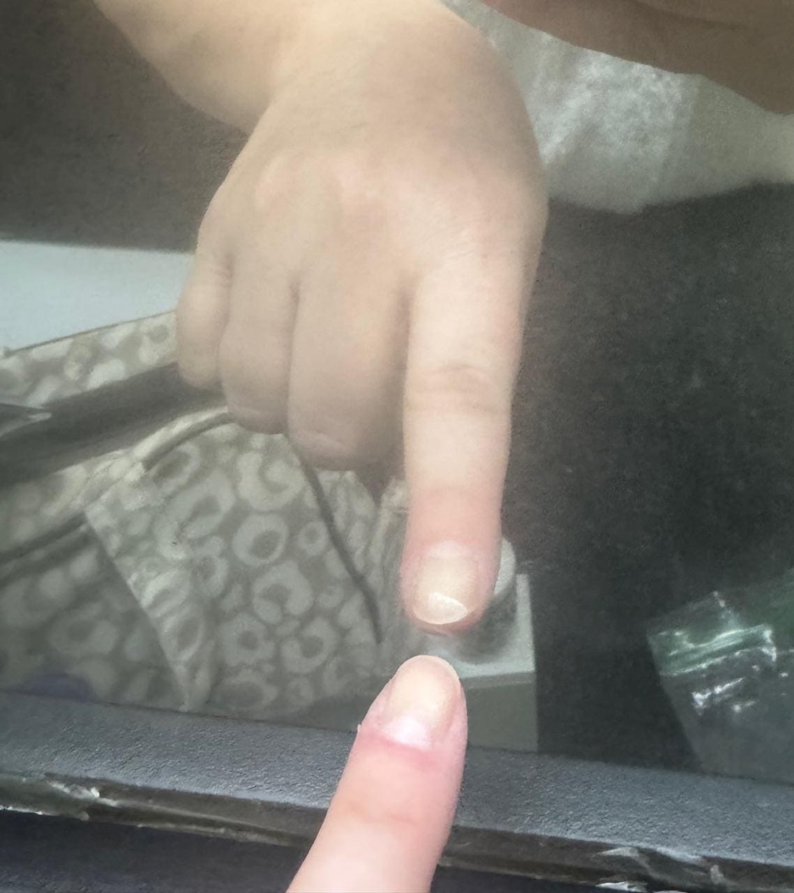 Bathroom mirror had reflection, therefore seemed to be a legit mirror.