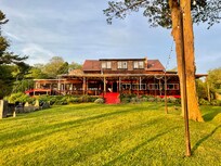 Lovely sunset on the back lawn of the Lake House