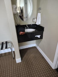 Vanity and sink outside bathroom