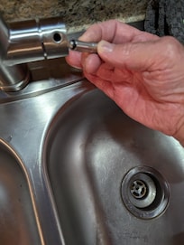 Broken faucet handle (wrapped with thread to repair?)