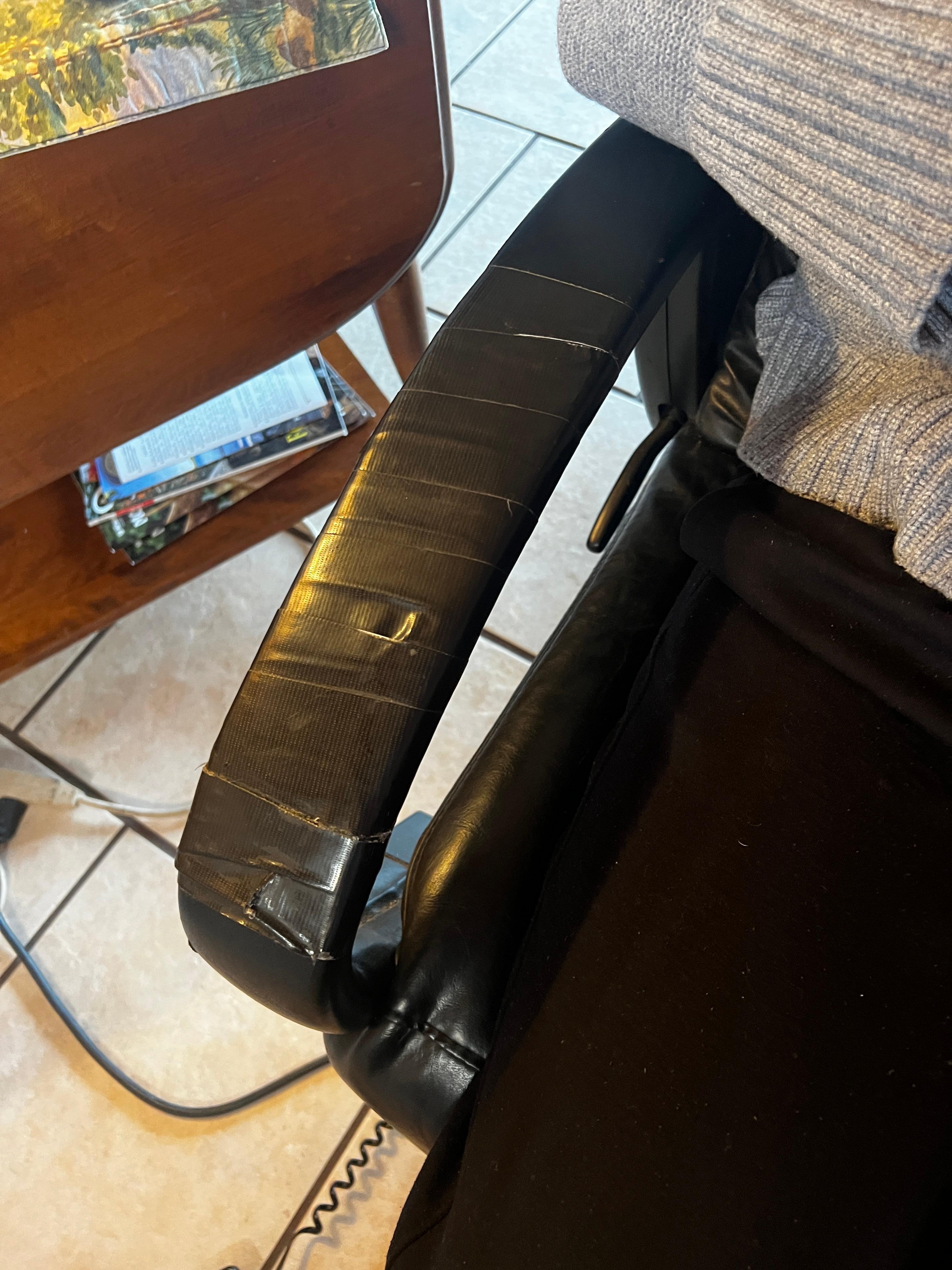 Massage chair and kitchen bar stools repaired with duck tape