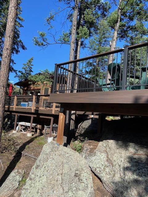 Backyard view of the cabin and deck.
