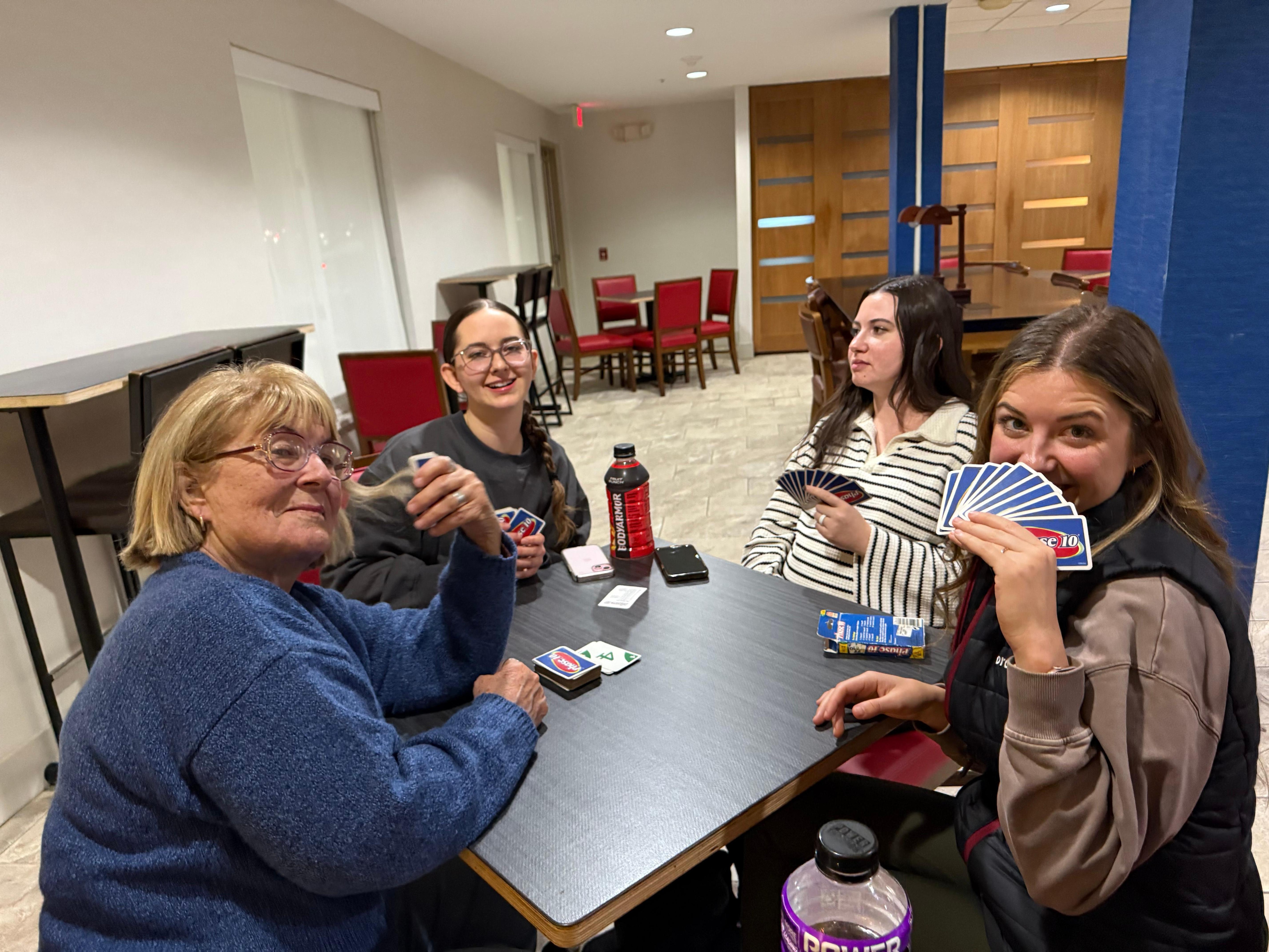 my daughters and I gathered in the breakfast room area H evening to play cards and games. They were quite a few people who also enjoyed the warm lounge and lovely fireplace.