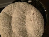 Soiled pillow on chair