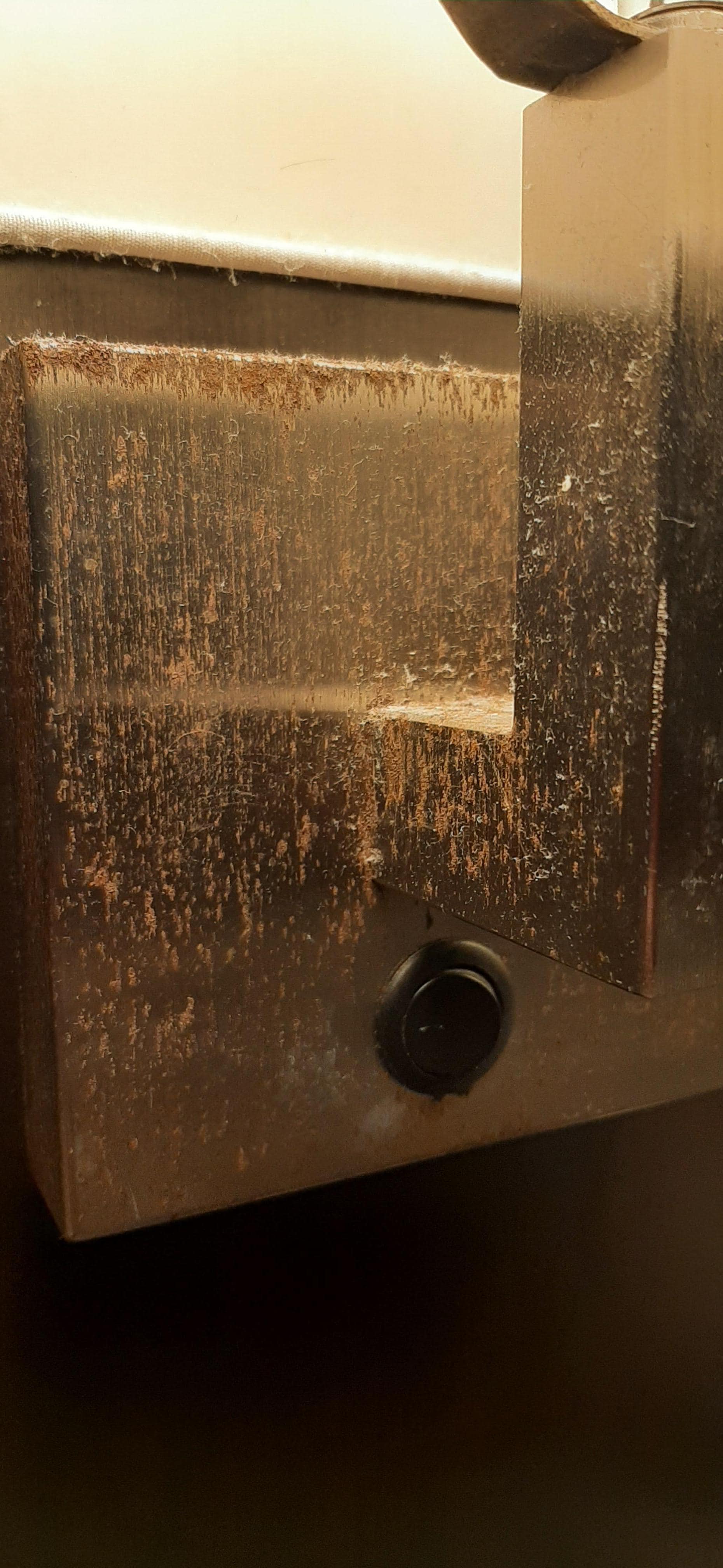 Rust on the other wall lamp