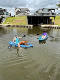 My husband and I enjoying the kayaks with our dog:)