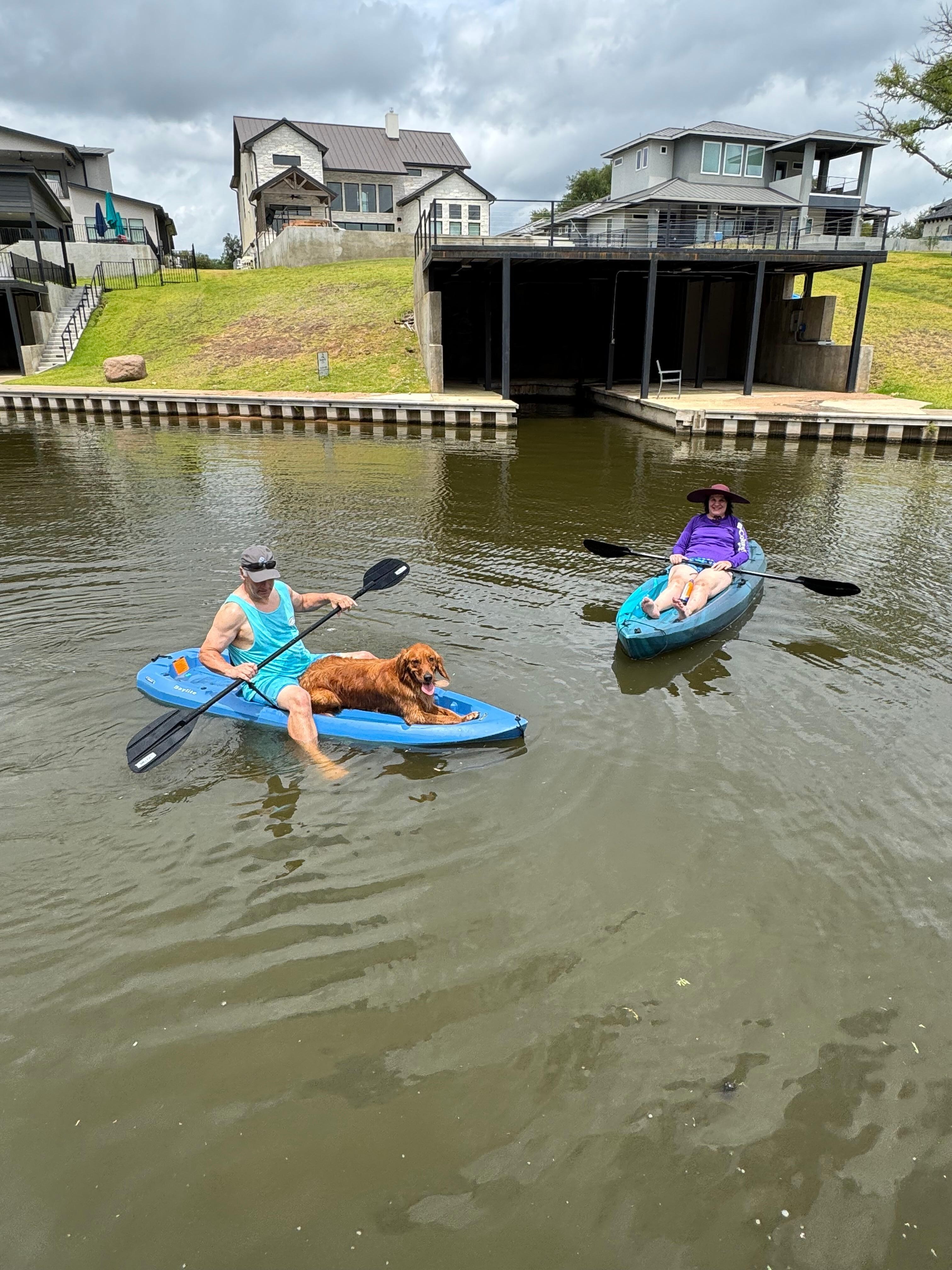 My husband and I enjoying the kayaks with our dog:)