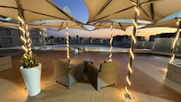 Sunrise view of ocean across pool deck view 1