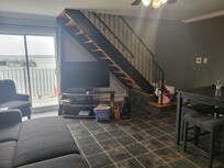 Downstairs full kitchen living room. Bedroom and bath upstairs