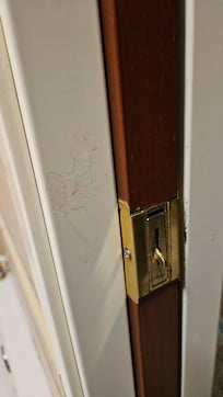 Some sticky pink stuff was on the wall.