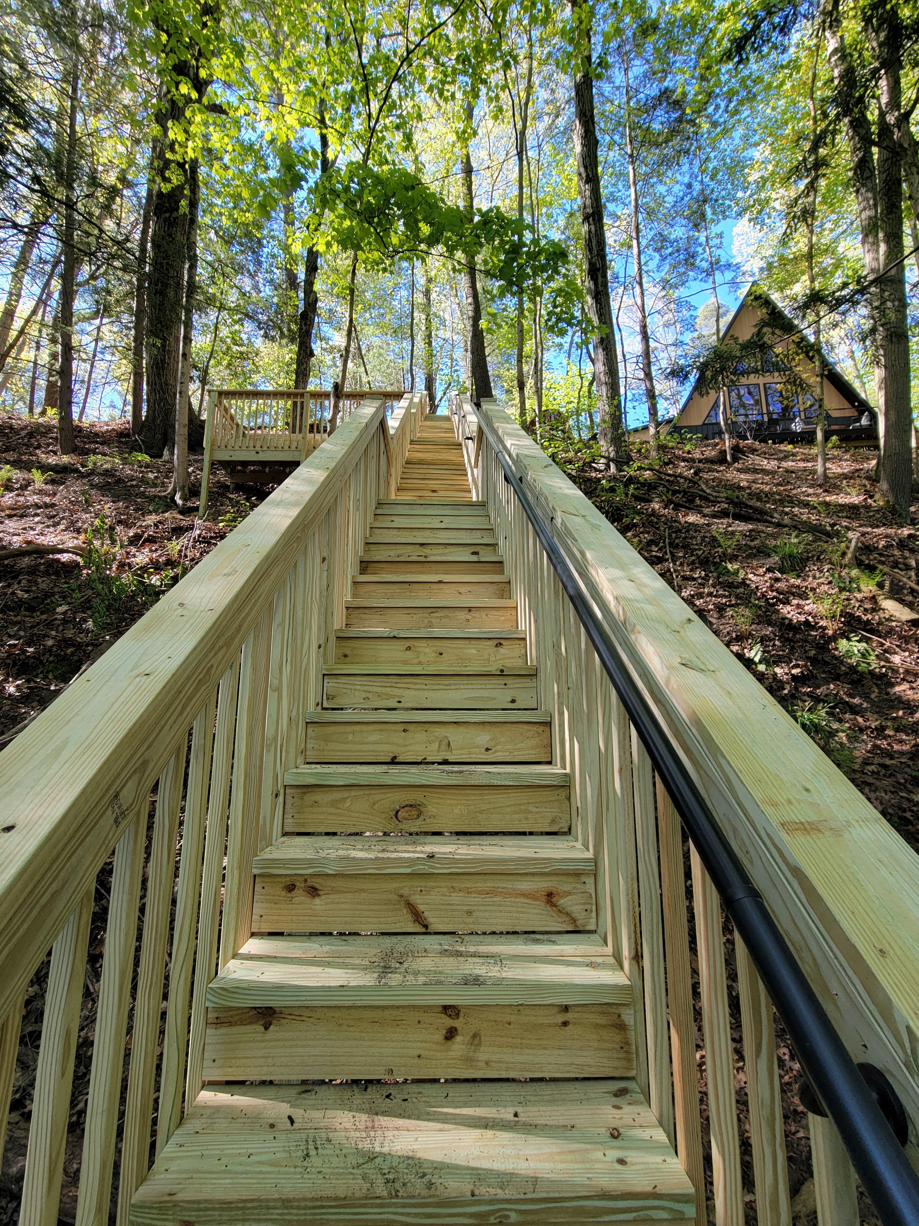 New stairway down the bluff with seating area.
