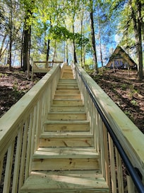 New stairway down the bluff with seating area.