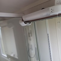 light fitting in bathroom damaged