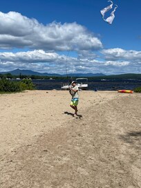 Huge open beach to fly kites. To have races and play games. Tons of outdoor lounge chairs and chairs around the firepit.