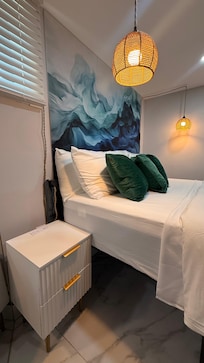 The room has a cute design and the beds are so comfy.