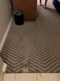Ripped dirty carpet