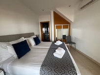Second bedroom with queen bed and a bathroom.