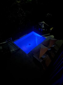 Pool lit up at night