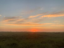 Beautiful sunset at Blue Skye beach house