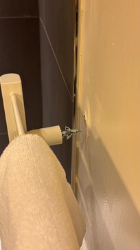 Towel warmer popped out of wall