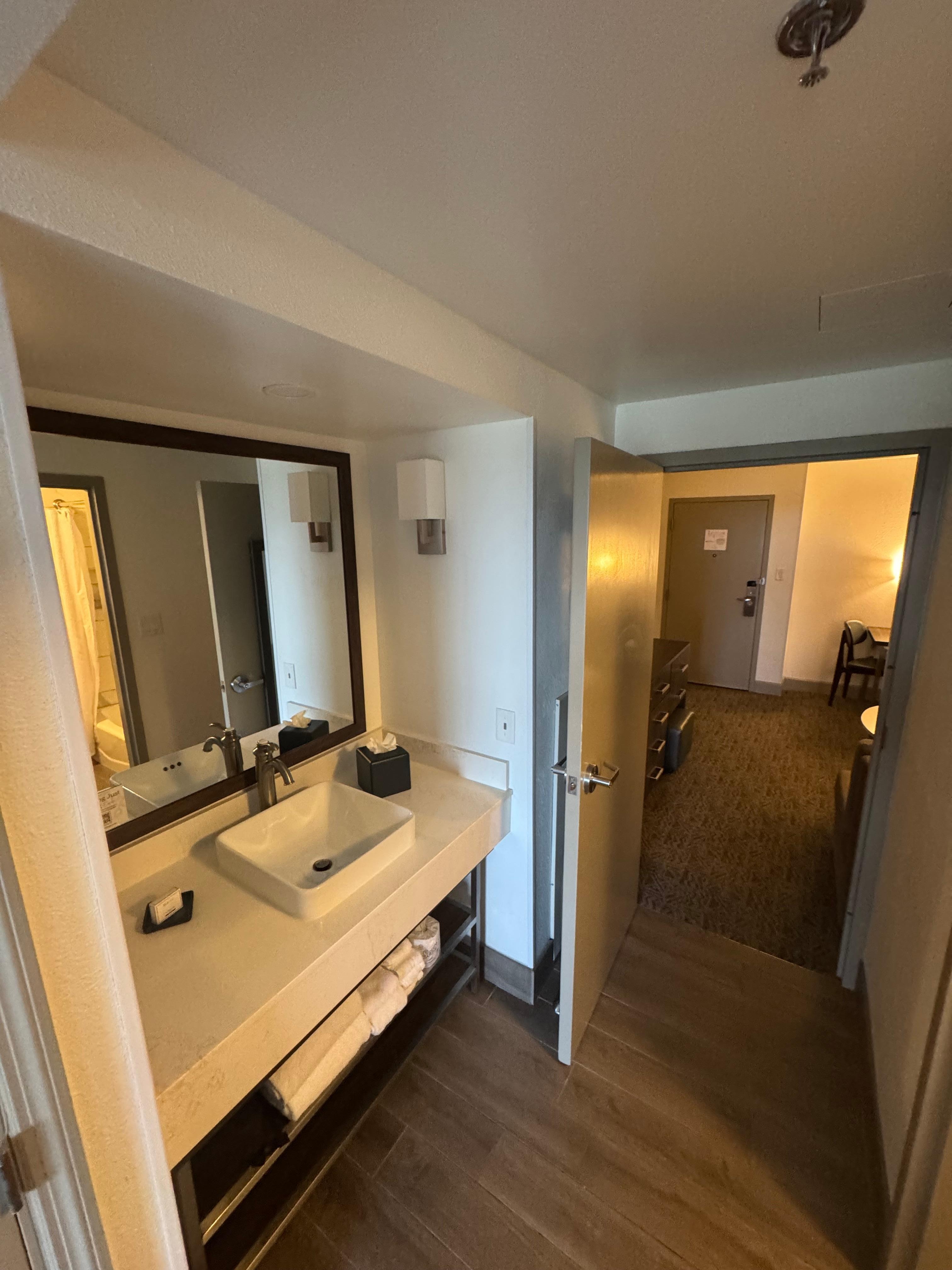 Sink looking into living room 