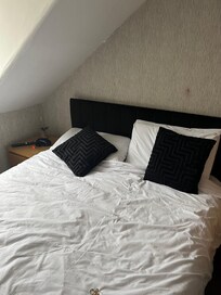 This is the bed supposedly made.