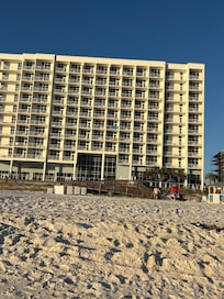 View of back of hotel from the beach.