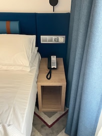 Bedside unit - without drawers. Phone & Power points.