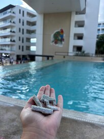 Tiles found all over the property. Especially in the pools. My daughter would bring me handfuls every day. Not safe for young children