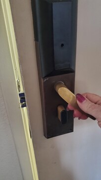 Front door exit showing how the prongs don't retract unless you pull down hard and fast.