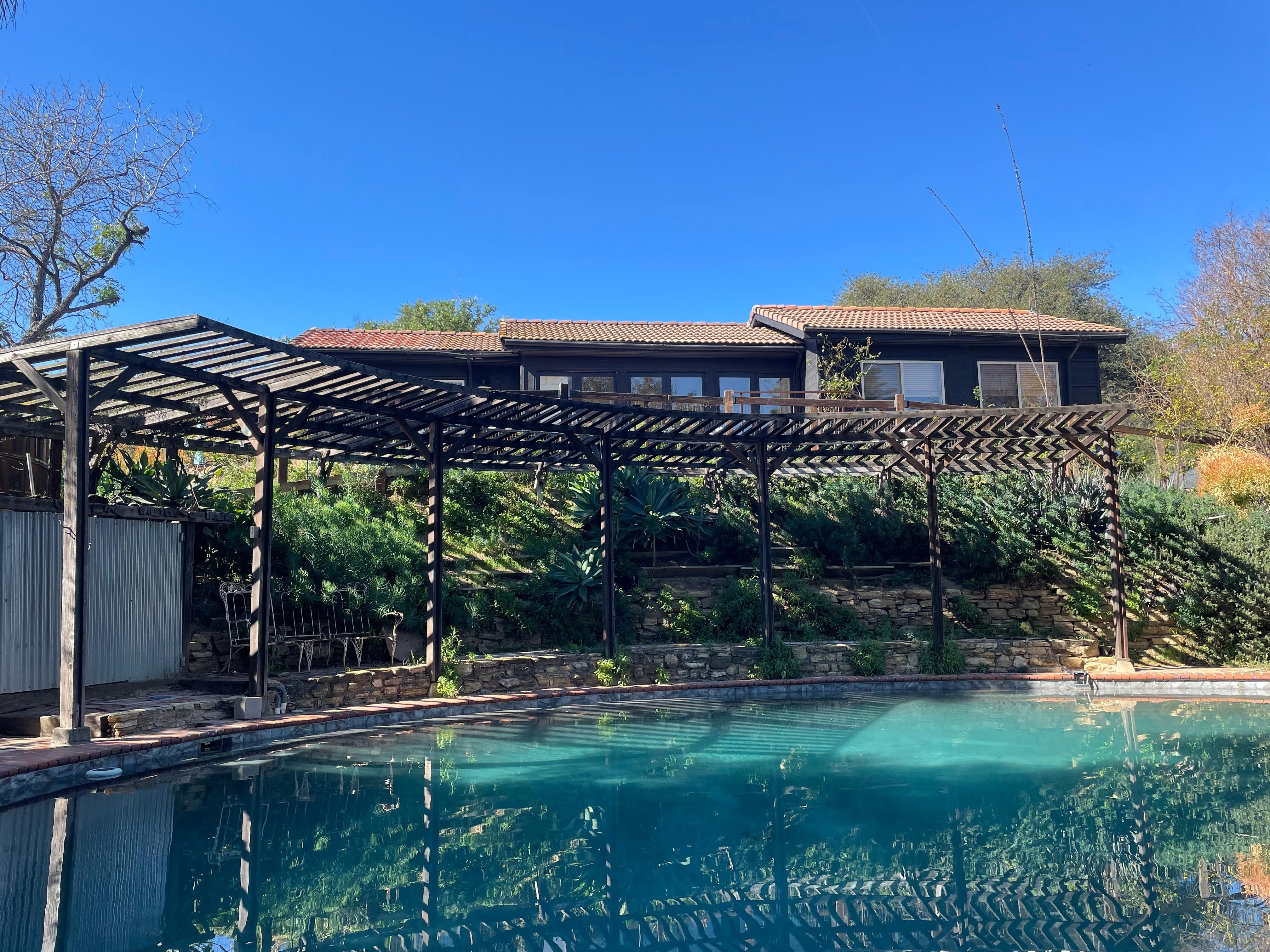 The cottage from the pool (hot tub not visible).