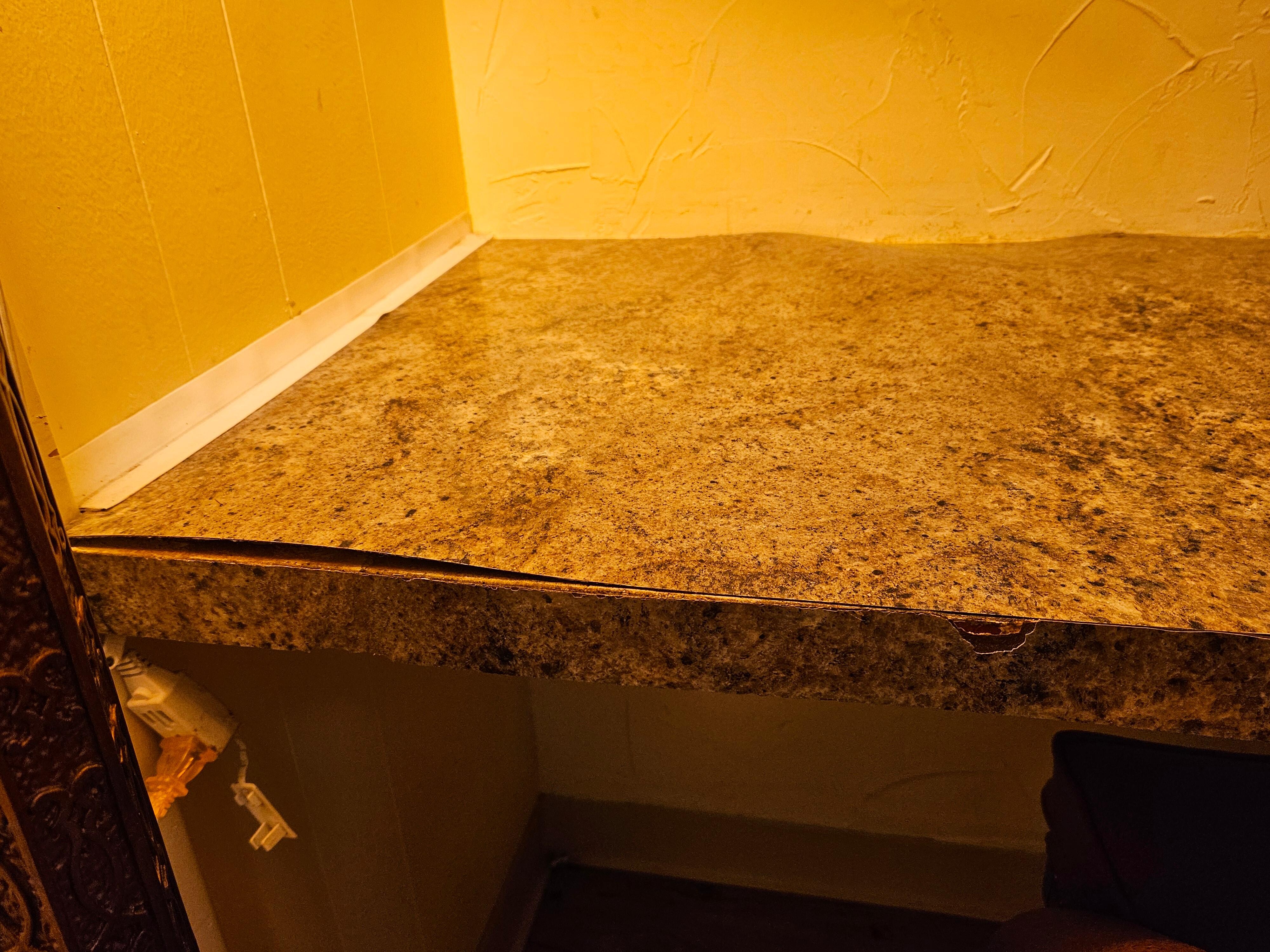 Dest warped and rotted from water damage 