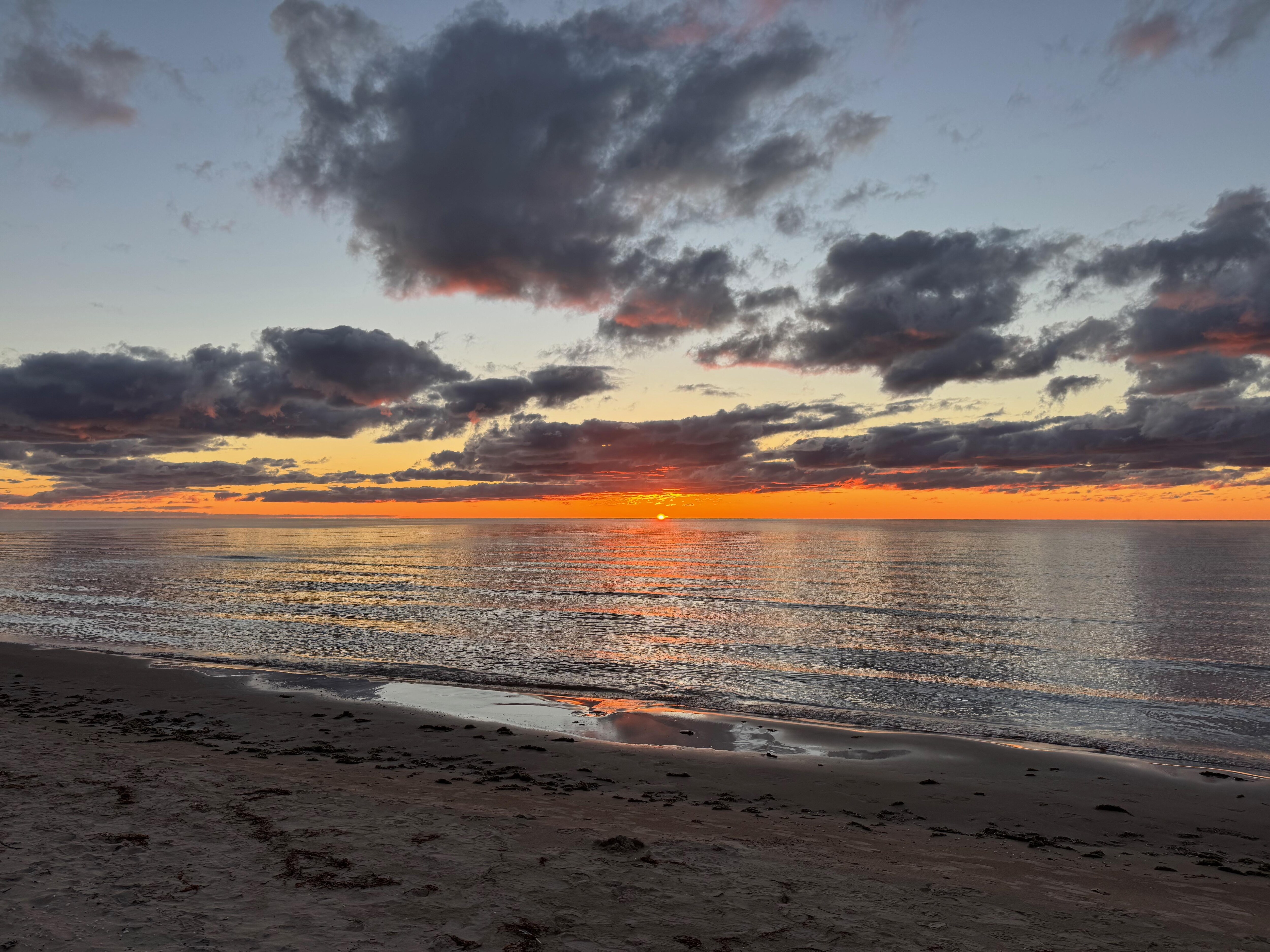 Sunrise from beach behind Vrbo.