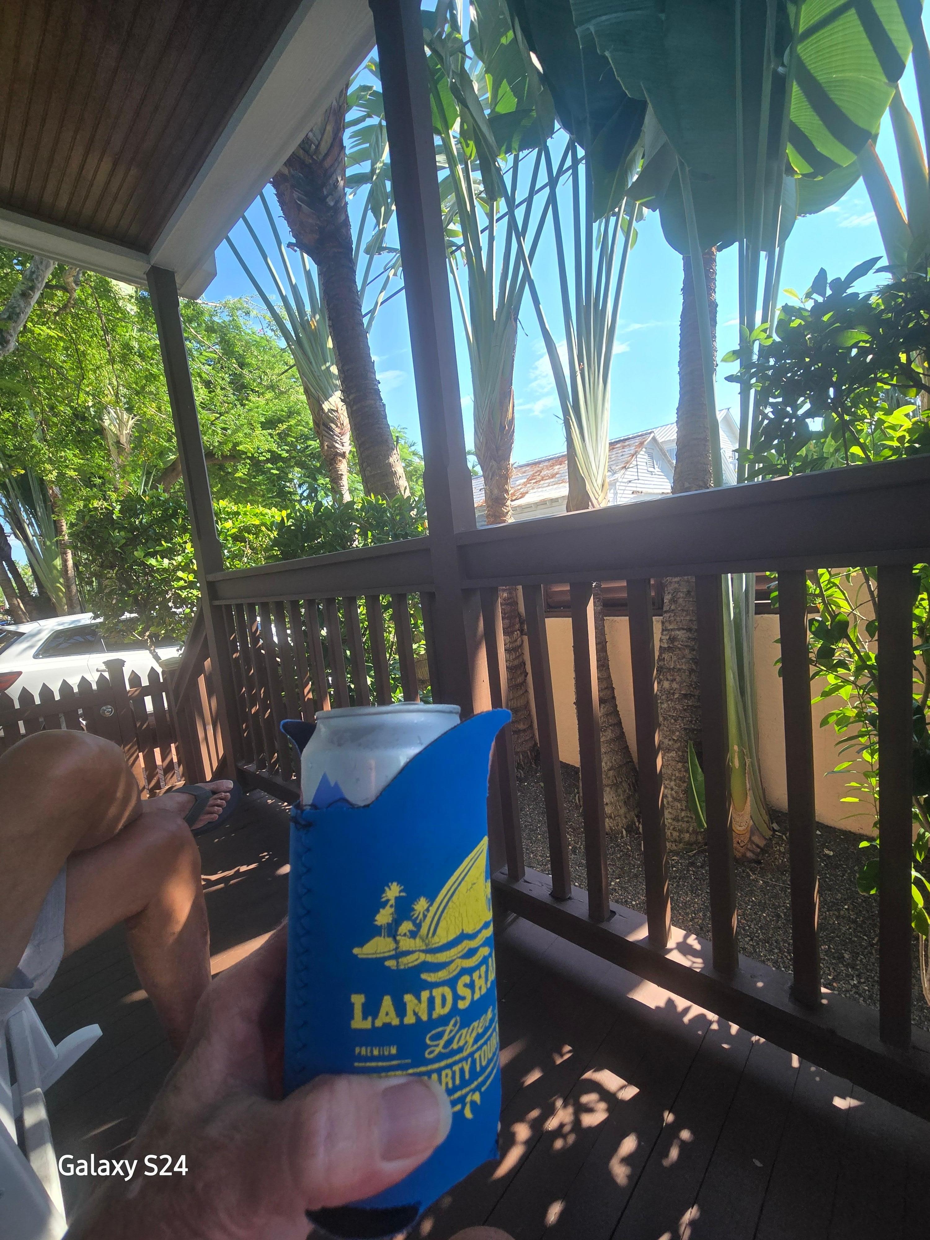 Private entrance  front porch with rocking chairs