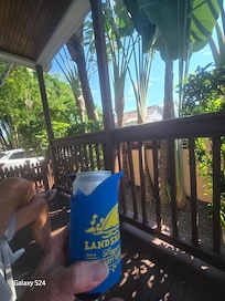 Private entrance  front porch with rocking chairs