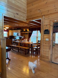 Kitchen table is roomy and has bench seating