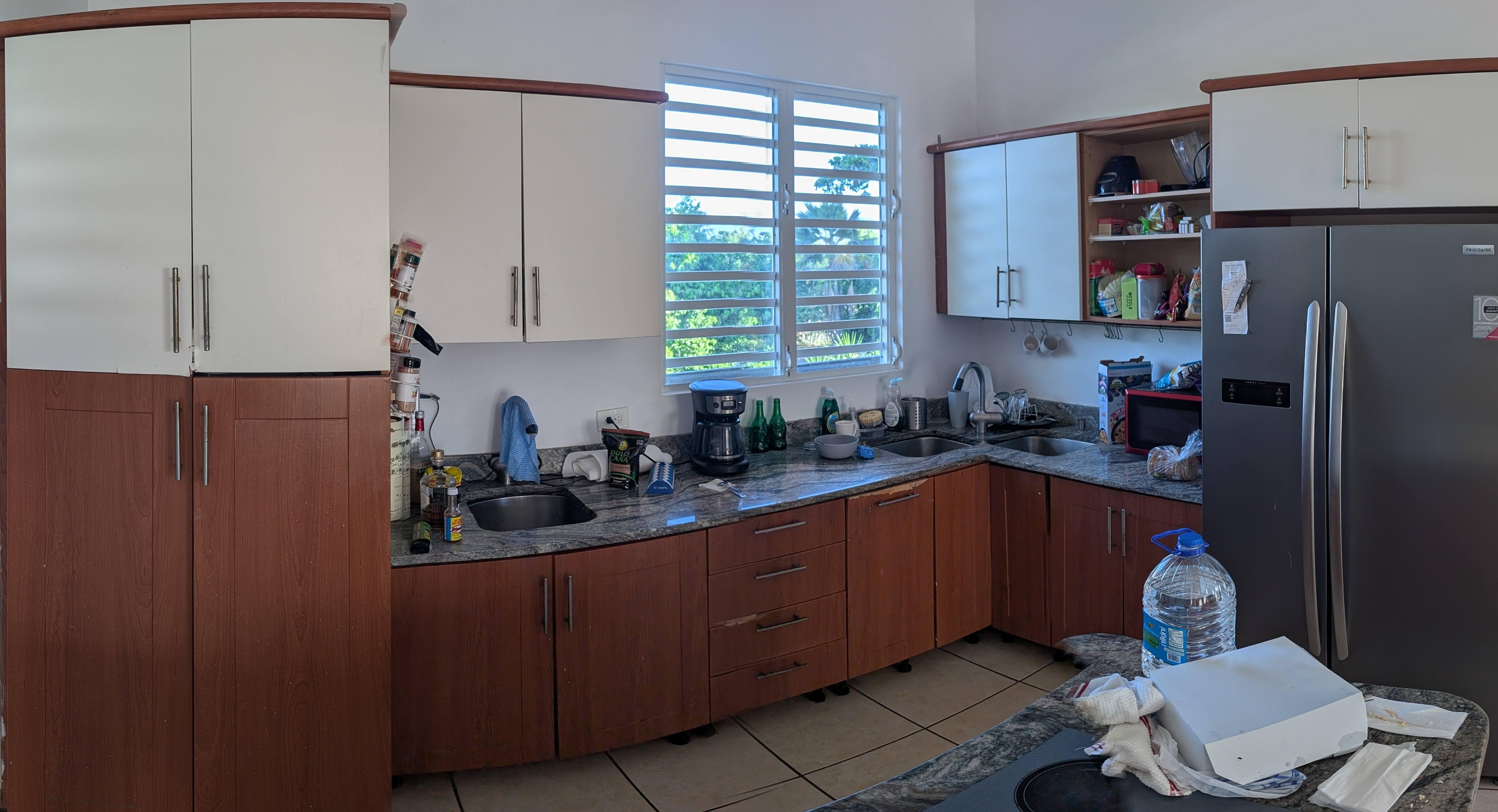 It's hard to see in pictures, but cabinets in house 1 were somewhat beat up. Many handles were loose/missing screws.