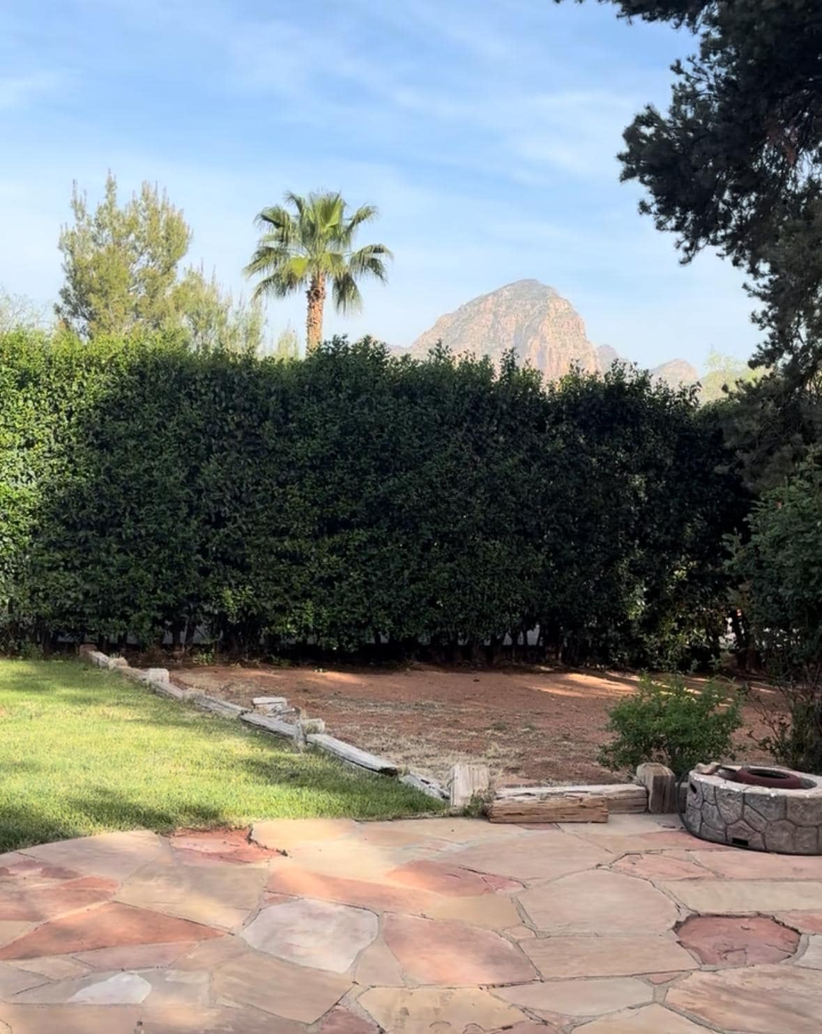 Drink your morning coffee in this beautiful backyard 