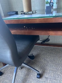 desk and chair contained left over food from previous guest