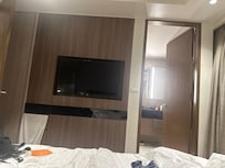 Master bedroom with tv and Queen bed and shower with bath tub then another shower at other bathroom that those in the other room uses ..