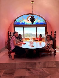 Kids at very cool table with amazing view!