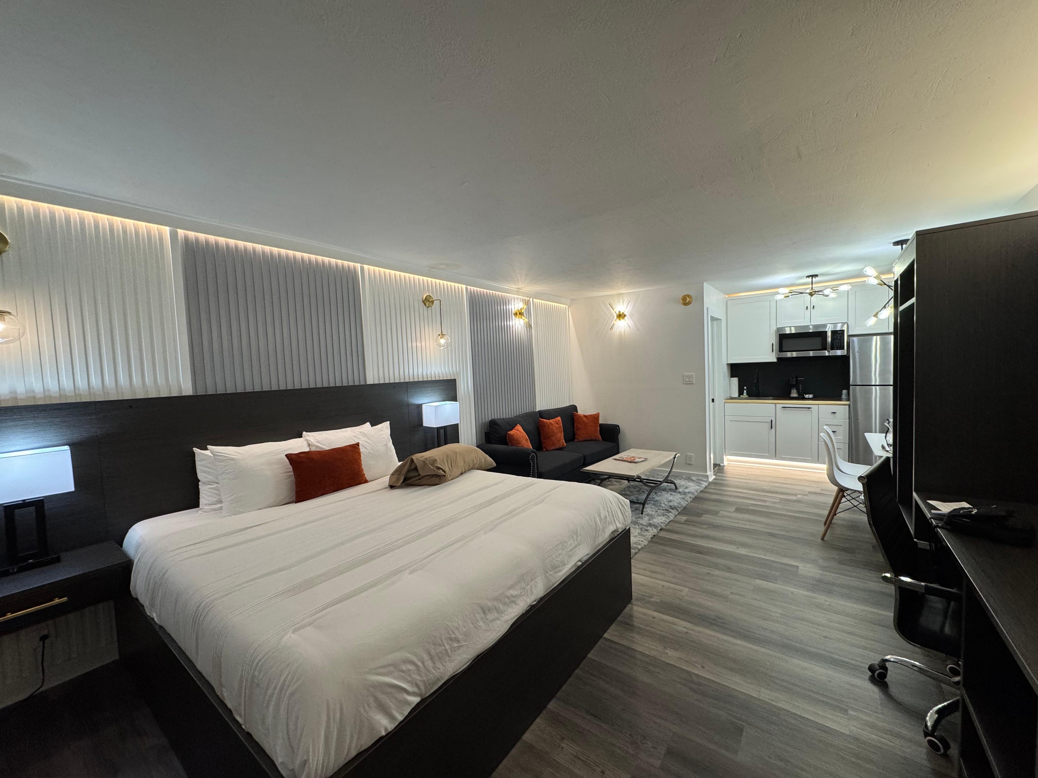 This room had a kitchenette, small dining table (2 chairs) and a full size sofa.