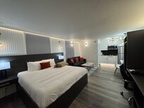 This room had a kitchenette, small dining table (2 chairs) and a full size sofa.